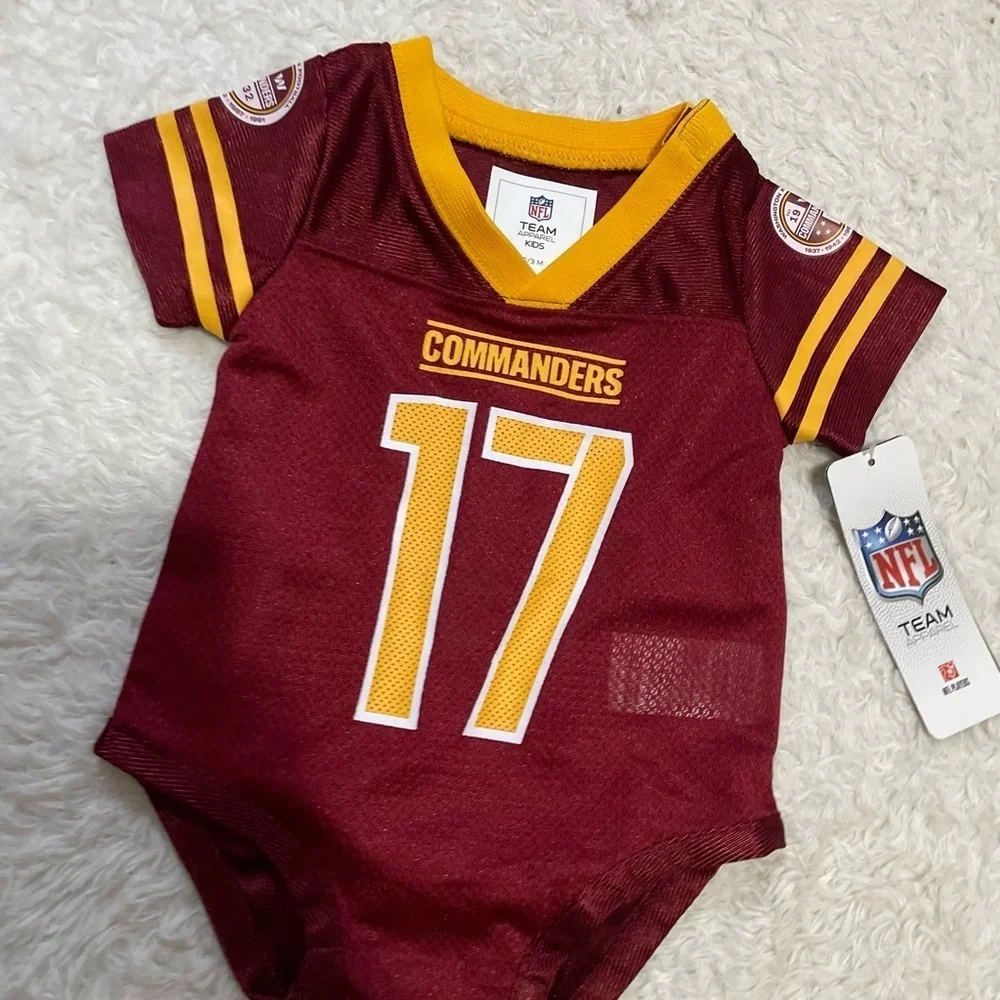 NFL Team Apparel Kids Maroon and Yellow Onesie